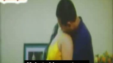 Boy putting hands inside blouse of punjabi aunty