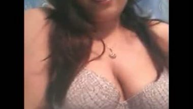 Stripping to reveal busty big boobs