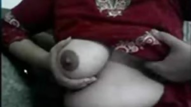 Colleague likes playing with her gigantic boobies in office