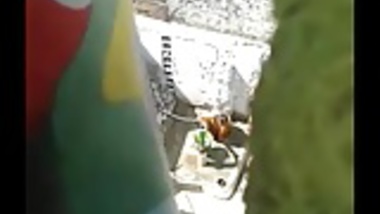 Spying india bhabi taking shower outdoor