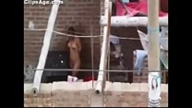 Indian labor girl having an open bath