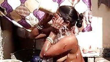 Pregnant Desi Indian Village girl Bathing outdoor
