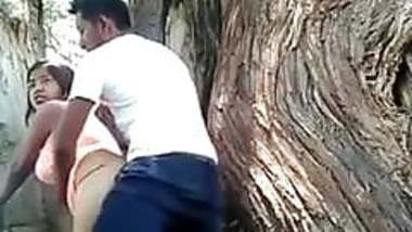 Guy fucking girl outdoor